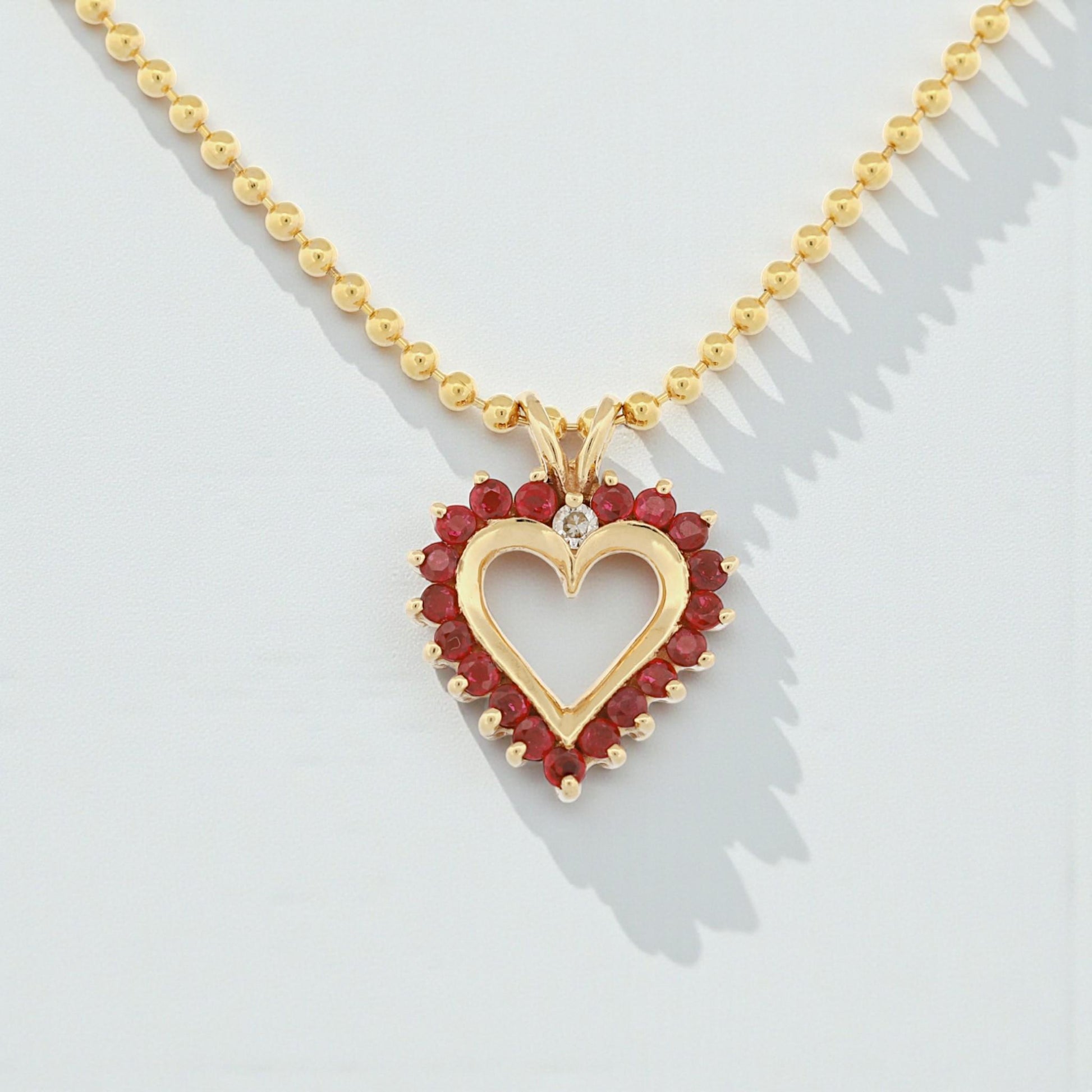 Vintage 14k Yellow Gold Heart Pendant Necklace with Red Gemstones & Diamond