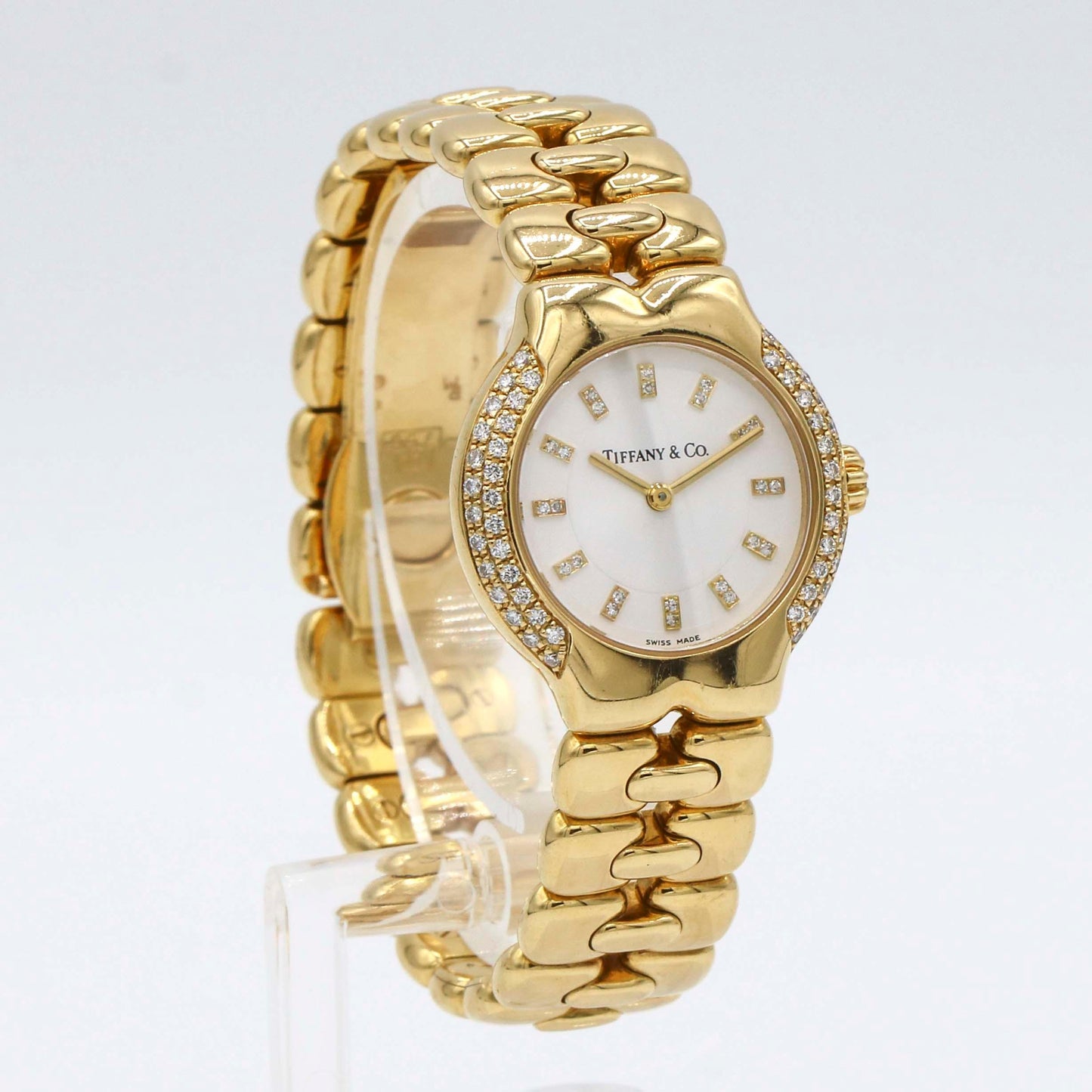 Tiffany & Co. Ladies 18k Gold Tesoro Watch with Diamond Bezel and Dial - 31 Jewels Inc.