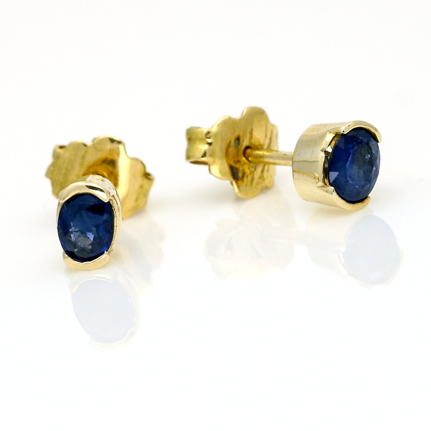 Oval Blue Sapphire Stud Earrings in 14k Yellow Gold