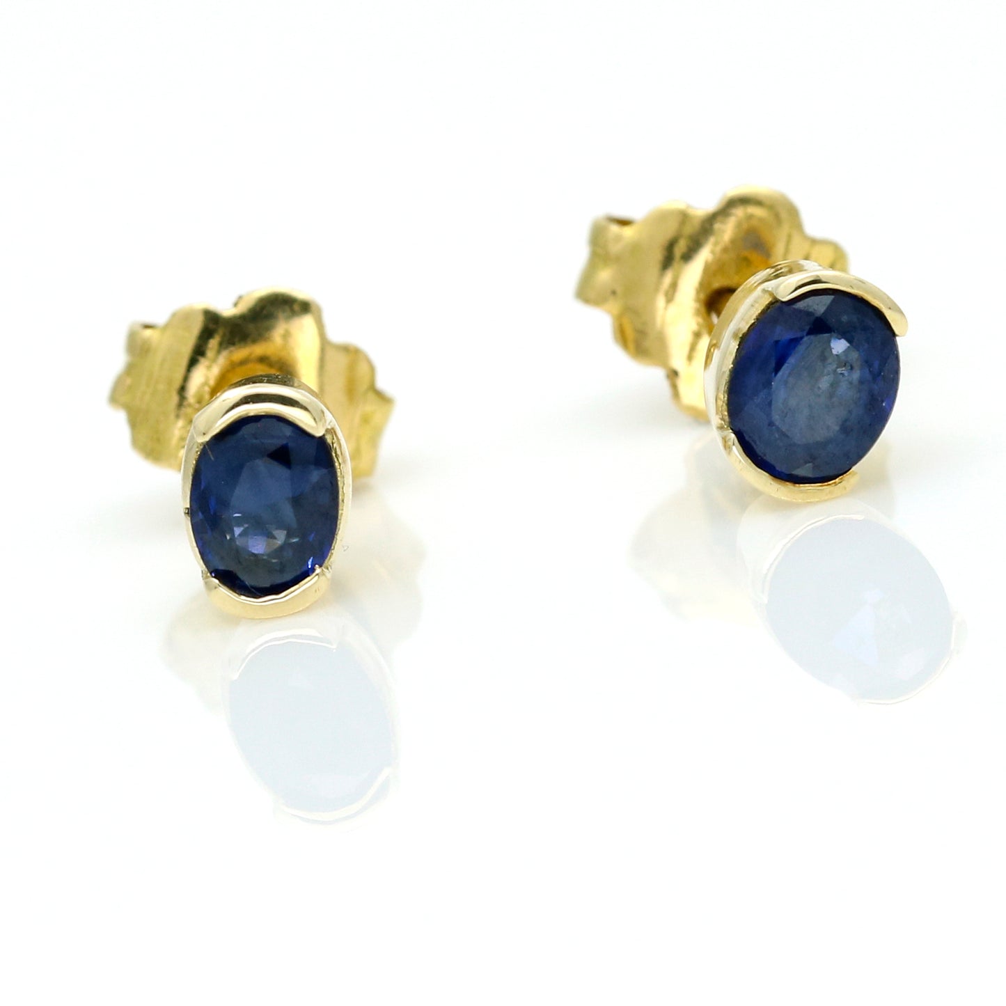 Oval Blue Sapphire Stud Earrings in 14k Yellow Gold